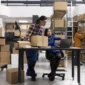 home business employees preparing products boxes local delivery 85x85